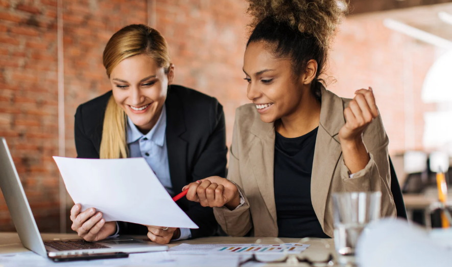 Professionals reviewing document